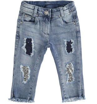 Pantalone in denim stretch con toppe foderate in tulle e paillettes ido